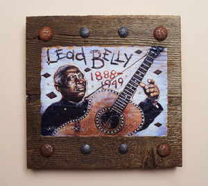 Leadbelly portrait on wood / Leadbelly art / Leadbelly portrait / Leadbelly painting / the Blues painting / the Blues portrait / the Blues art / Blues art / Blues painting / Blues music art / painting on wood / Blues music / Blues prints / Blues musicians / Blues musicans art / Jessie Buddell / Primalscenes.com / Primal Scenes